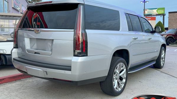 Silver Cadillac Escalade