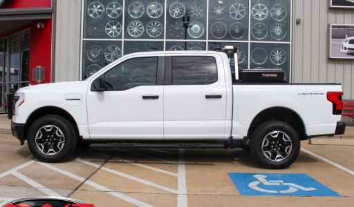 White 2023 Ford F150 Lightning Fleet